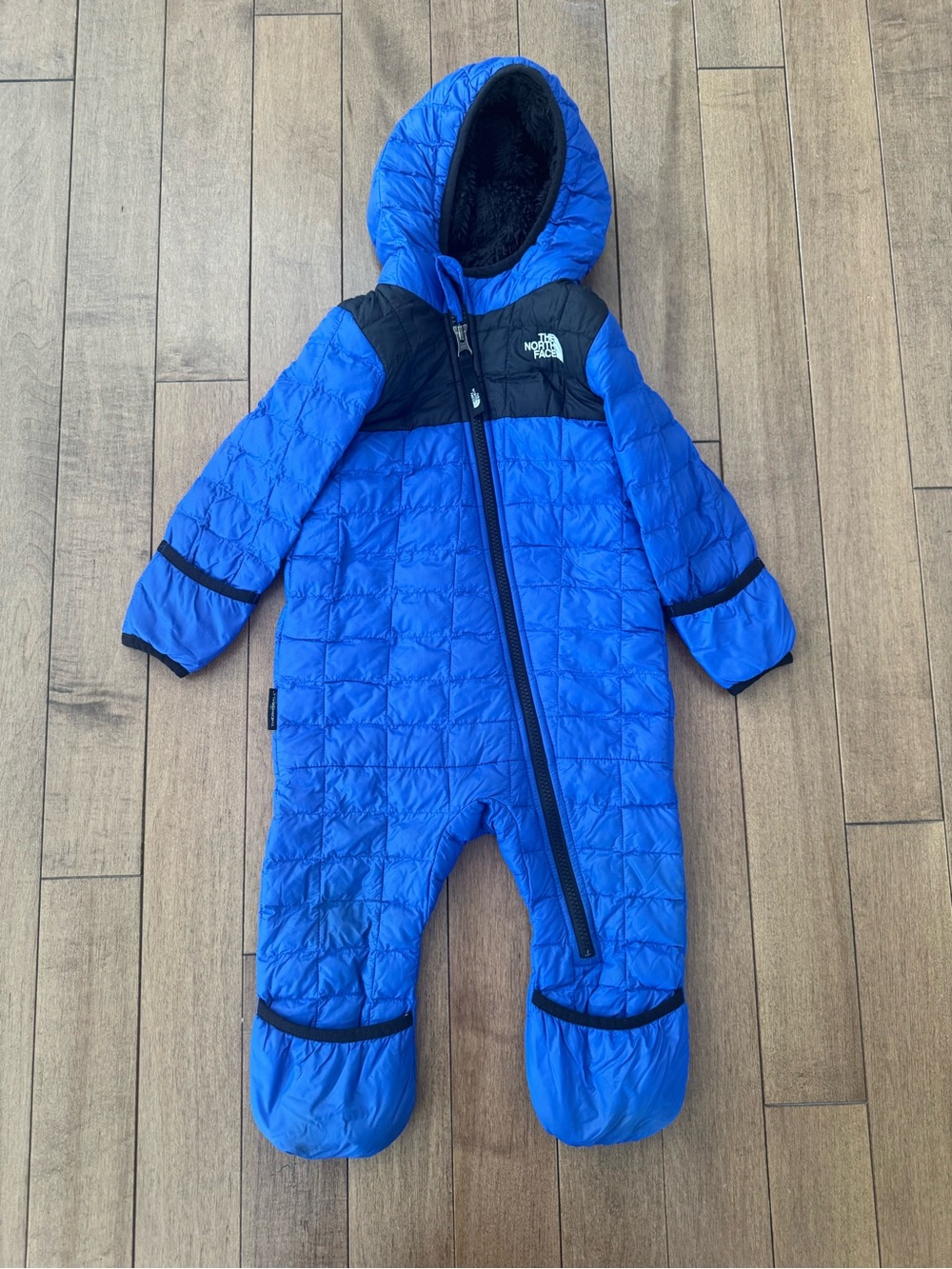 The North Face Blue and Black Insulated Kids One-Piece Footie